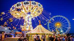 Der Strombedarf auf der Wiesn steigt, doch die Netzanschlüsse stoßen an ihre Grenzen. Drei Batteriegroßspeicher von Tesvolt sollen die Zelte von Pschorr-Bräurosl und Löwenbräu für die Zukunft absichern.