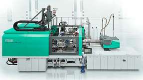 Der kompakte Allrounder Cube 1800 von Arburg produziert Zweikomponenten-Verschlusskappen mit kurzer Zykluszeit und automatisierter Teileentnahme.