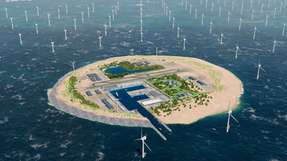 So soll die künstliche Insel für Windenergie aussehen: Wohngebäude, ein Hafen und eine Landebahn liegen inmitten von Windrädern.