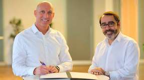 Machten die Kooperation perfekt: EWE Vorstand Markt Michael Heidkamp (l.) und Frédéric Gastaldo, CEO Swisscom Energy Solutions.