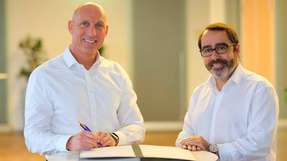 Machten die Kooperation perfekt: EWE Vorstand Markt Michael Heidkamp (l.) und Frédéric Gastaldo, CEO Swisscom Energy Solutions.