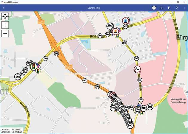 Ein realitätsnahes Verkehrsszenario mit vielen V2X-Netzwerkknoten und verschiedenen Nachrichtentypen, einer Stausituation und Ampeln: Im Laborprüfstand waveBEE hive können solche komplexen Testszenarien geprüft werden.