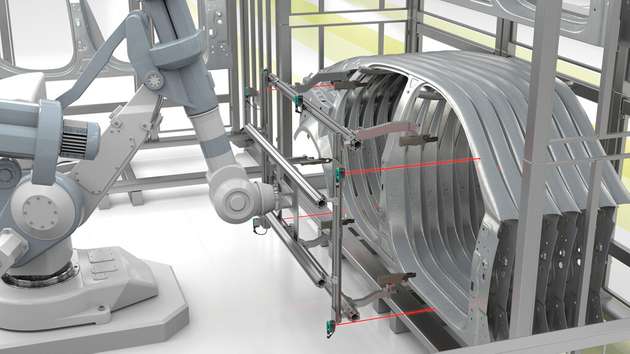 Damit die Roboter in der Schweißzelle sicher und zuverlässig arbeiten können, ist eine genaue Positionsbestimmung der zu entnehmenden Anbauteile erforderlich. Die Reflexionslichttaster der Serie R201 mit MPT bieten hierfür eine störsichere Distanzmessung im Nahbereich, aus der die Robotersteuerung die optimalen Greifkoordinaten ermittelt. 