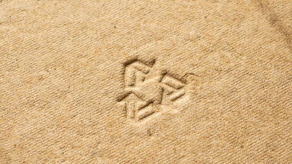 Papierverpackungen können durch biobasierte Beschichtungen funktionale Barriereeigenschaften erreichen und so eine nachhaltige Alternative zu Kunststoff darstellen.