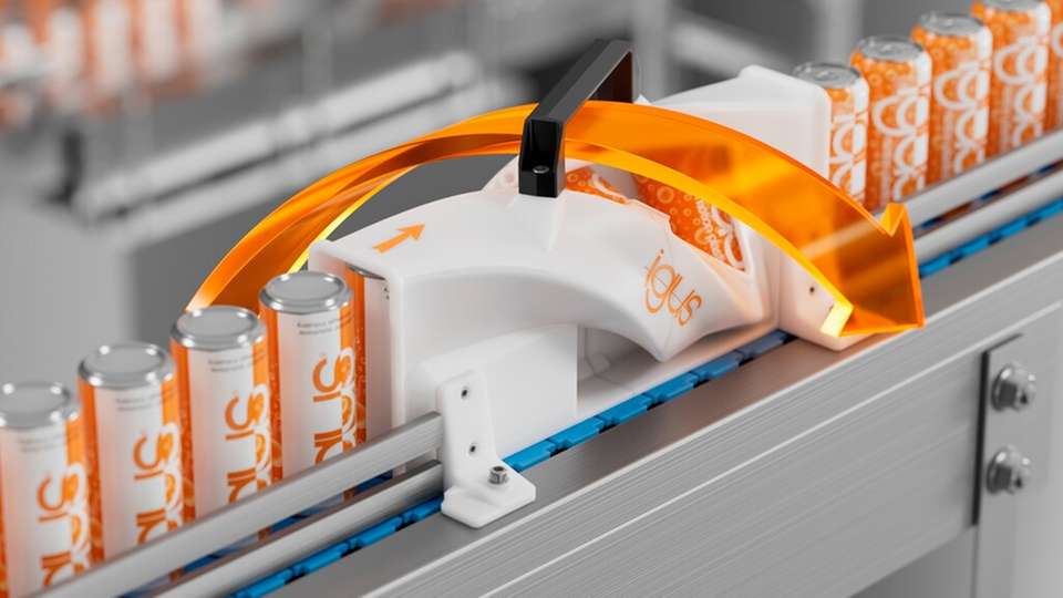 Der 3D-gedruckte Produktwender mit verdrehter Führungskontur ist für Dosen auf Förderbändern geeignet.